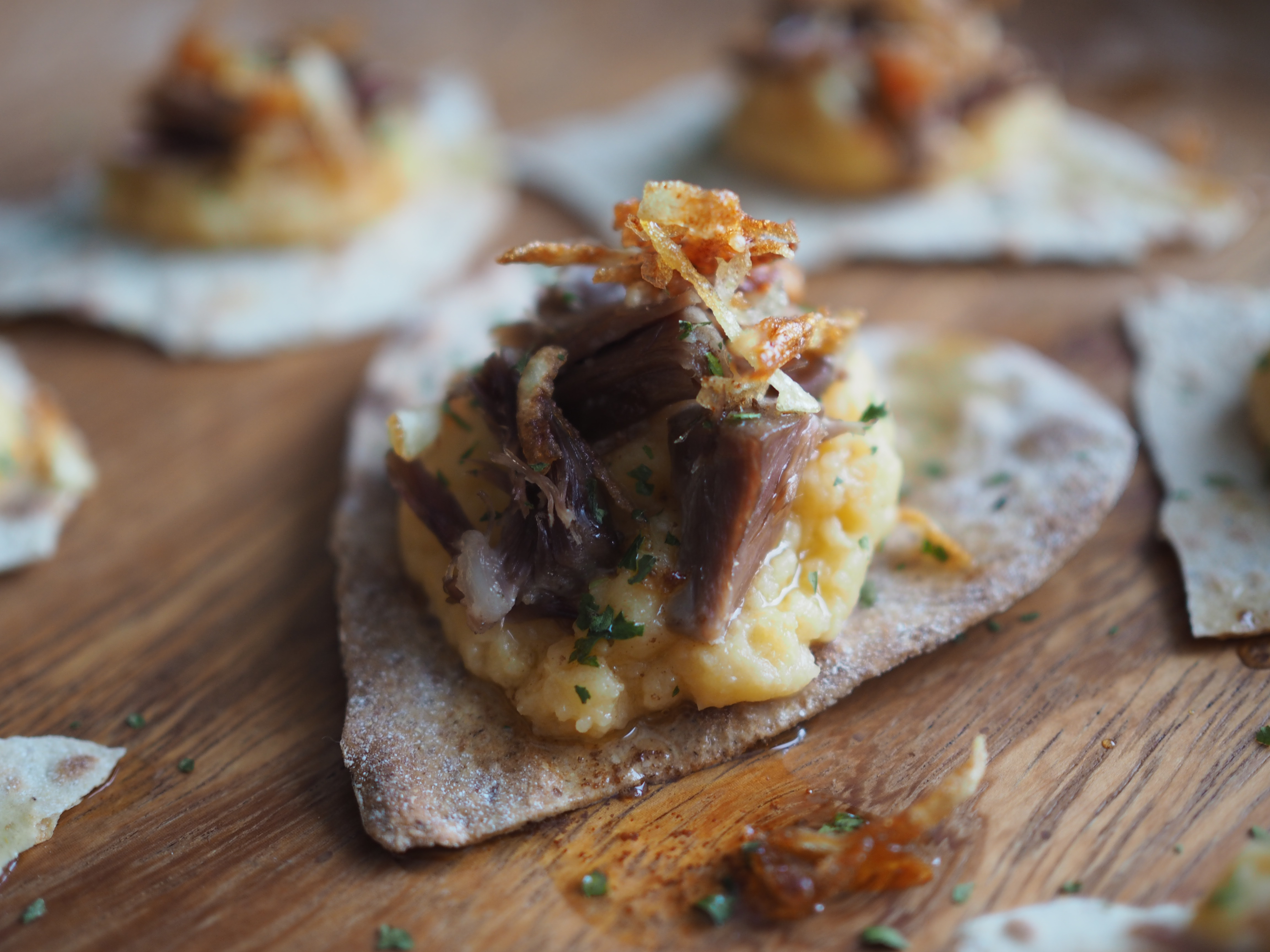 Pinnekjøtt with Flatbread, Rutabaga, Crispy Potatoes & Lemon Browned Butter