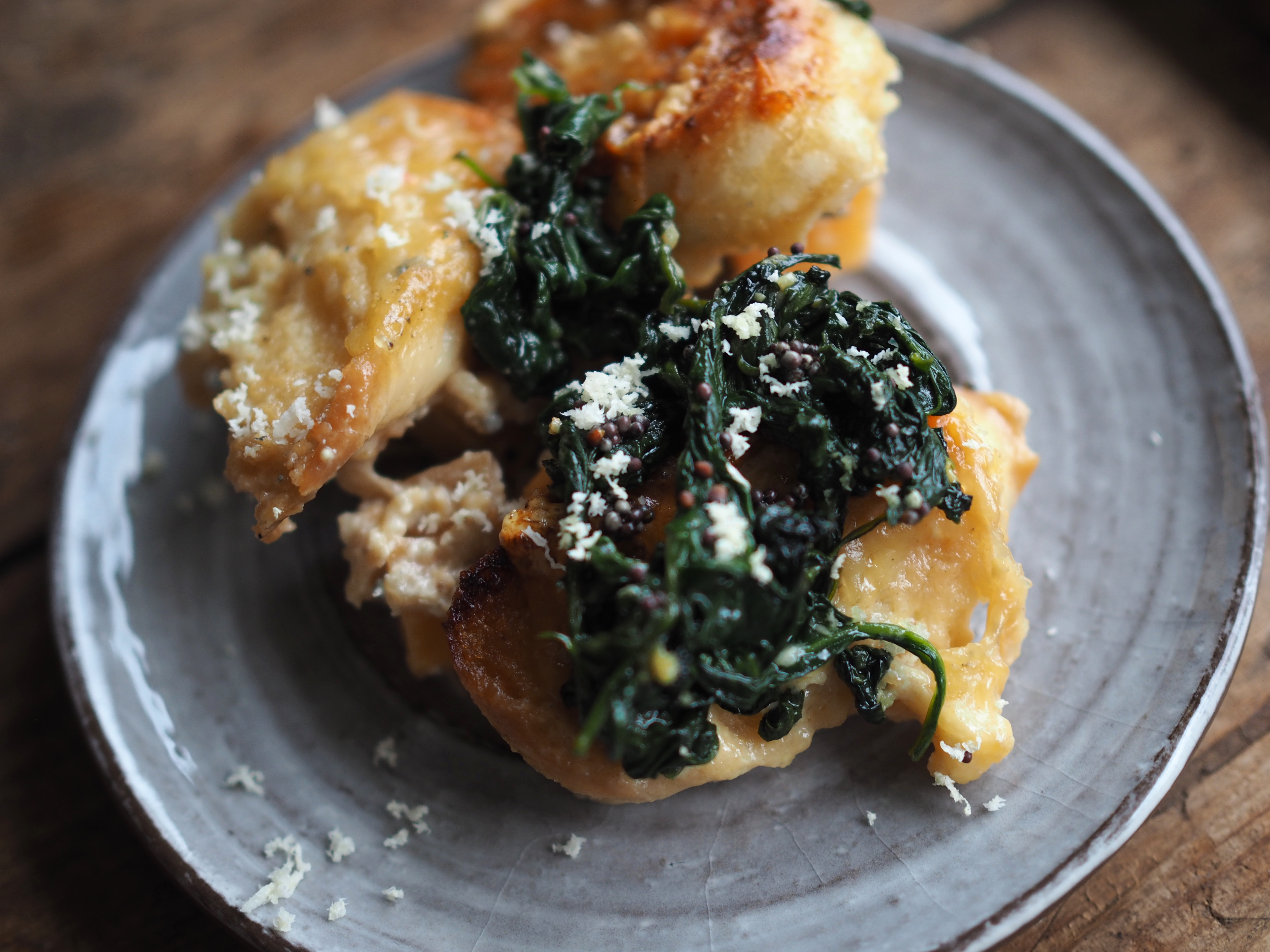 Cheesy Rutabaga, Bread & Beer Bake with Vinegary Greens, Toasted Mustard Seeds, and Horseradish